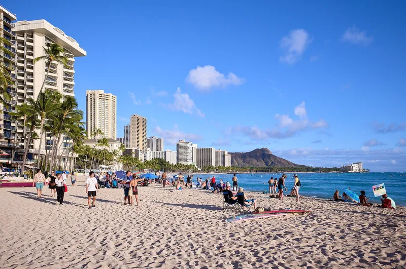 Waikiki Beach with the Honolulu skyline and the Diamond Head crater in the background