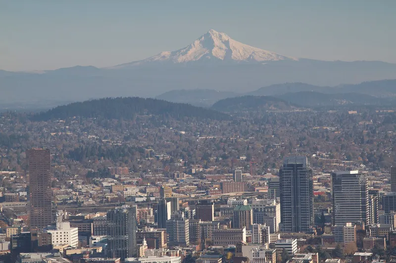 Portland Oregon with Mount Hood rising behind the city skyline